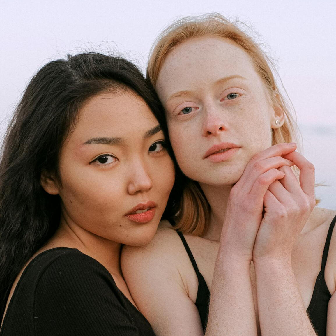 girls smiling together