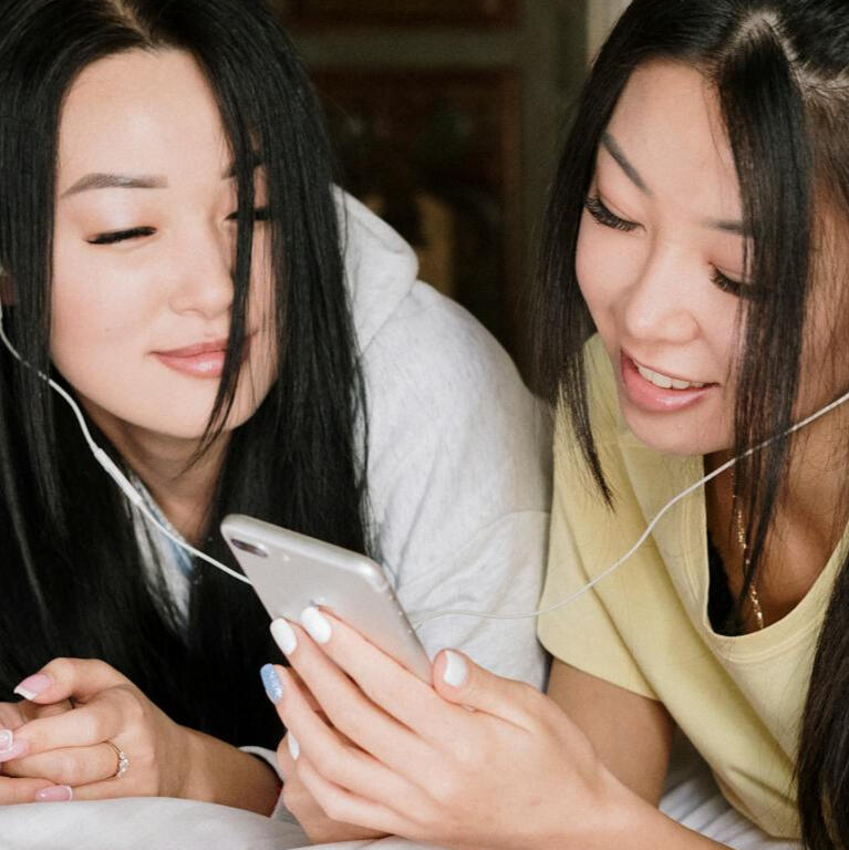 girl with braids smiling